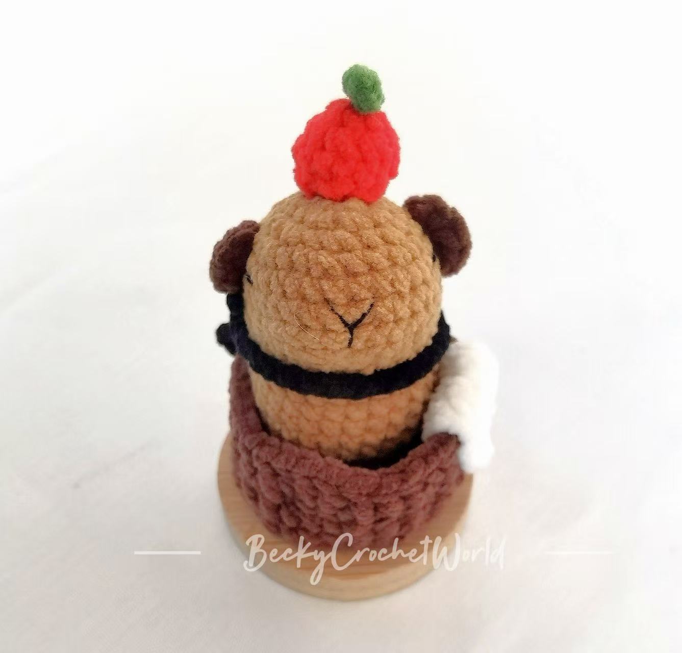 Capybara in a wooden bath