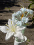 Lily with baby's breath